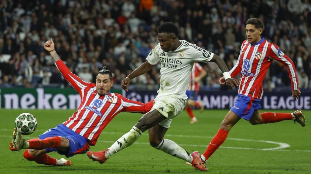 J.M. Giménez taponando un tiro de Vinicius Jr.