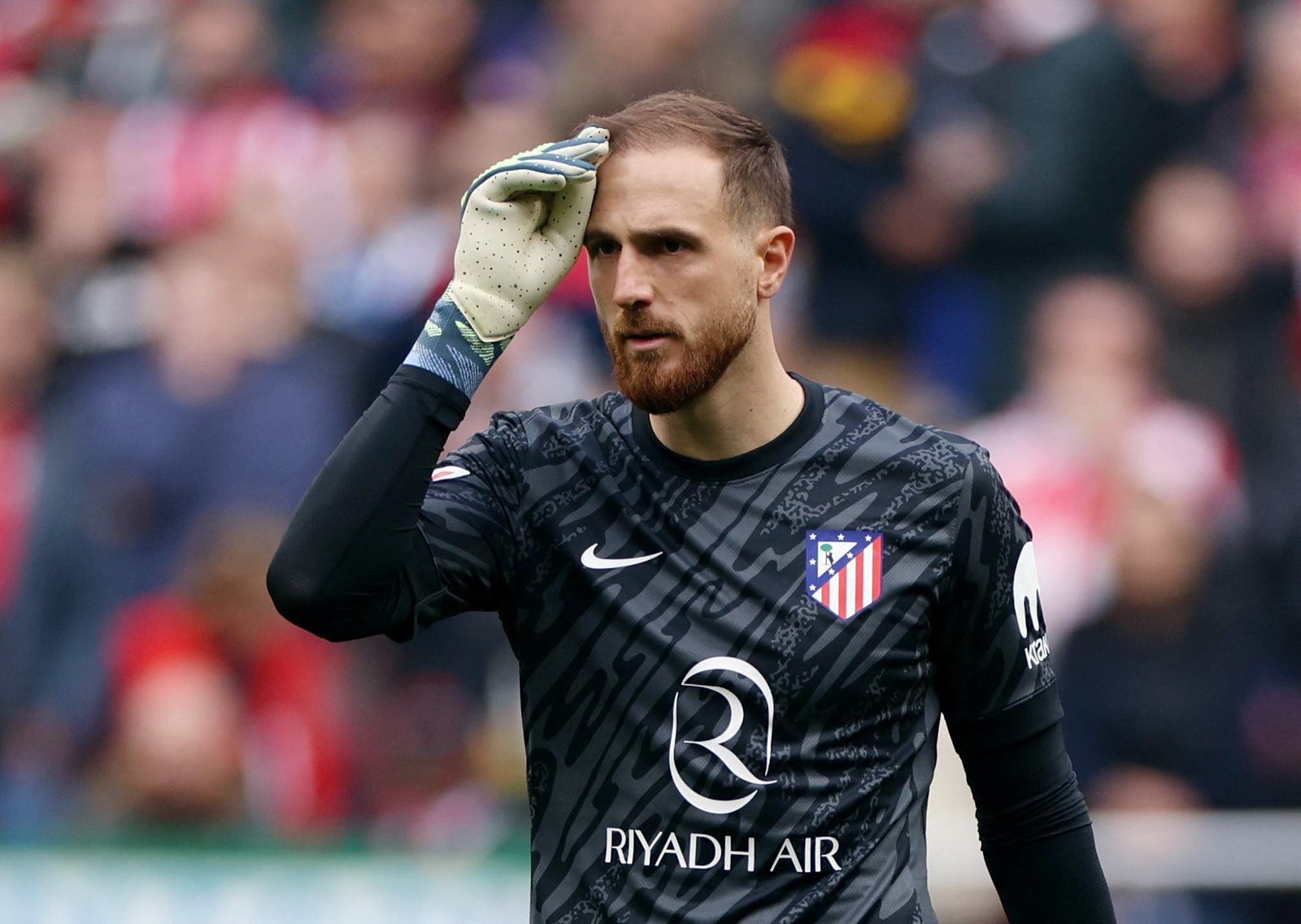 Oblak en un partido en el Metropolitano.