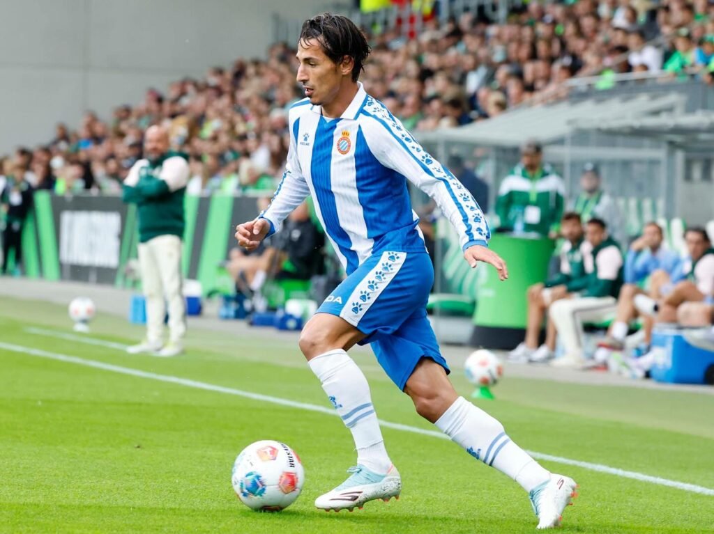 Pere Milla con la bola